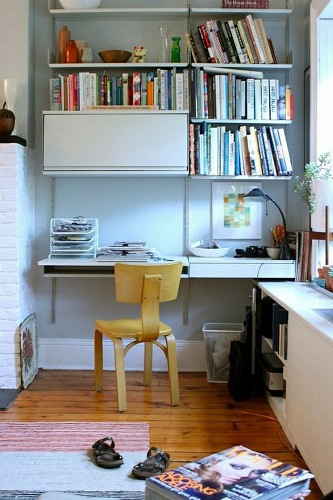 Desk-shelves-white-wooden-chair-books-periodicals-reading-lamp